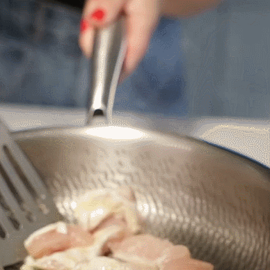 Metal utensil used with the titanium pan